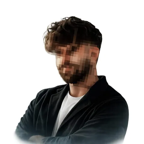 Joey from MOOmentum, arms folded, his face pixelated